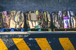 assorted box lot on brown wooden pallets